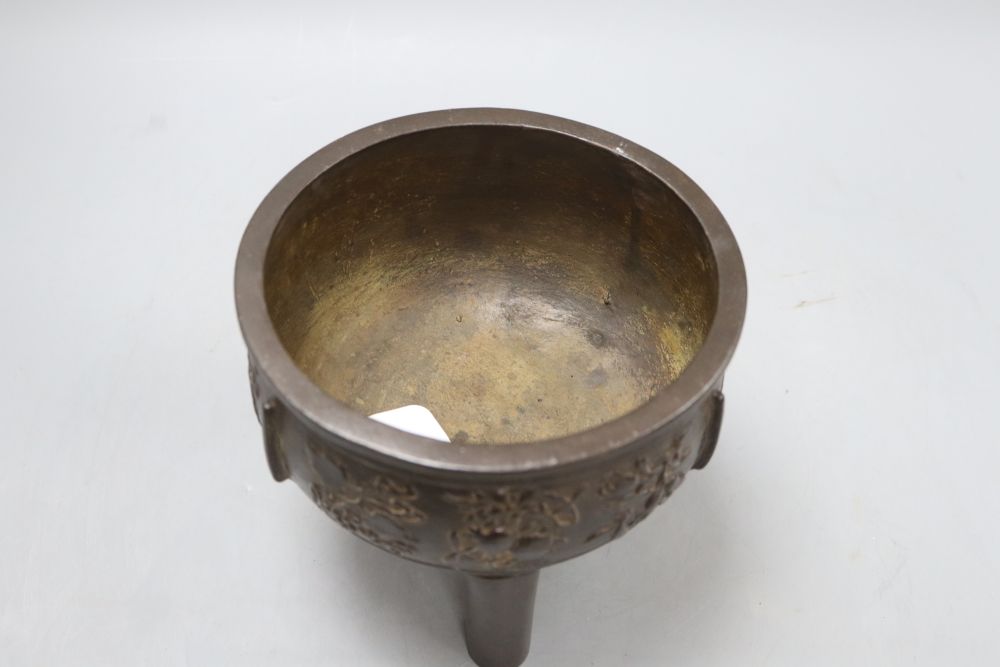 A Chinese late Ming bronze ding censer, height 15cm